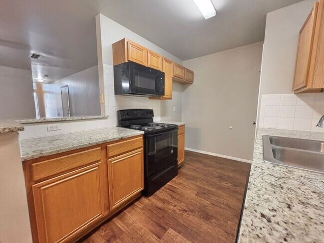 Building Photo - Available Now! Charming and Contemporary 3...