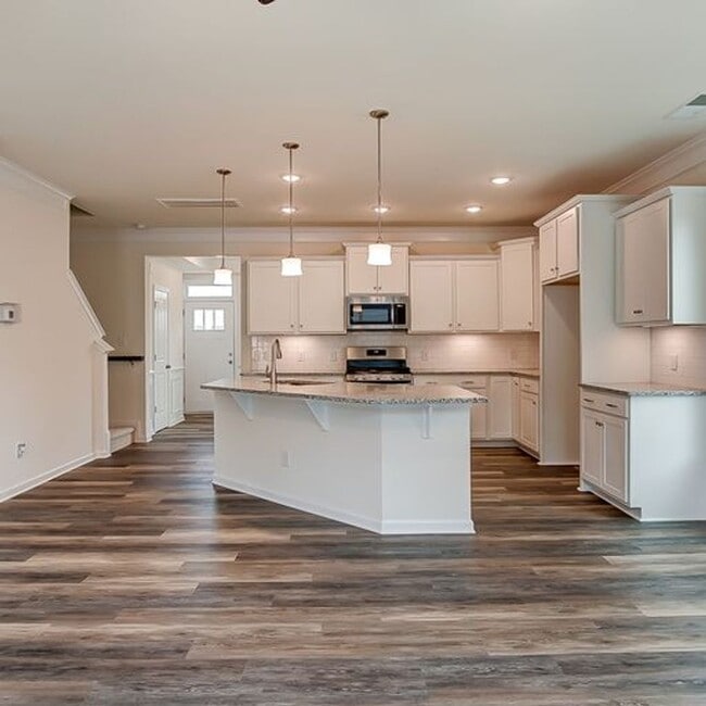 Building Photo - Move-In Ready, End Unit Two Story Townhome...