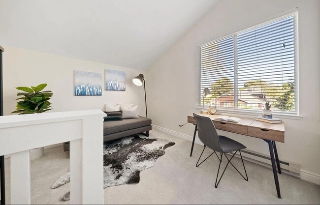 Building Photo - 1 bedroom plus loft features a functional floorplan with high ceilings