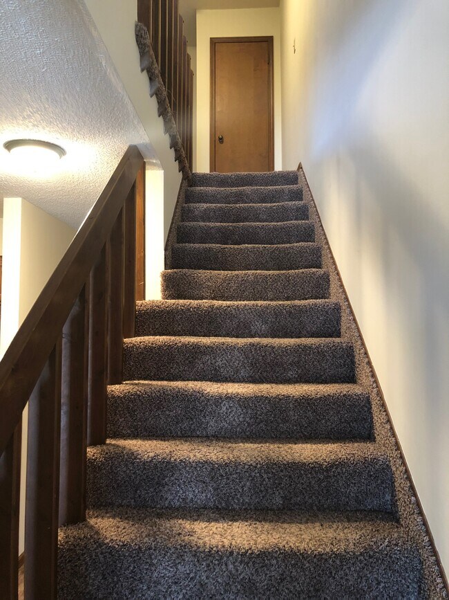 Staircase to 2nd floor bedrooms - 8713 W Thurman St