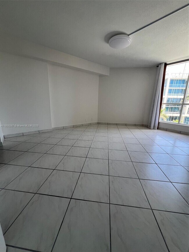Building Photo - 6767 Collins Ave