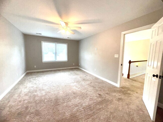 Building Photo - Spacious 4BR 2.5BA Home in Adams Farm with...