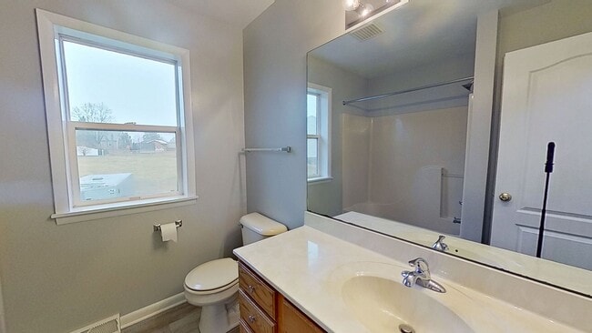 Building Photo - Move-In Ready 2BR Townhouse w/ Central AC & Off-Street Parking