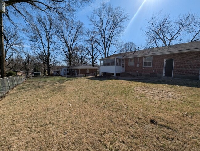 Building Photo - Fully Renovated Home with Sunroom, Garage & Huge Fenced Yard