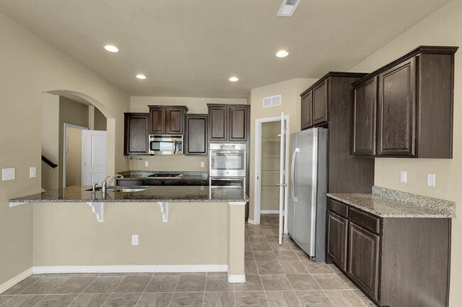 Building Photo - $2,540.95 - 4 Bed, 2.5 Bath Home in CO Springs with Fenced in Yard and 3 Car Garage!