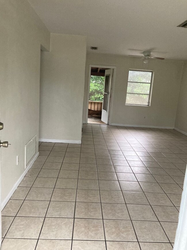 Building Photo - 2 Bed 2 Bath Home | Carport | Fenced Yard ...