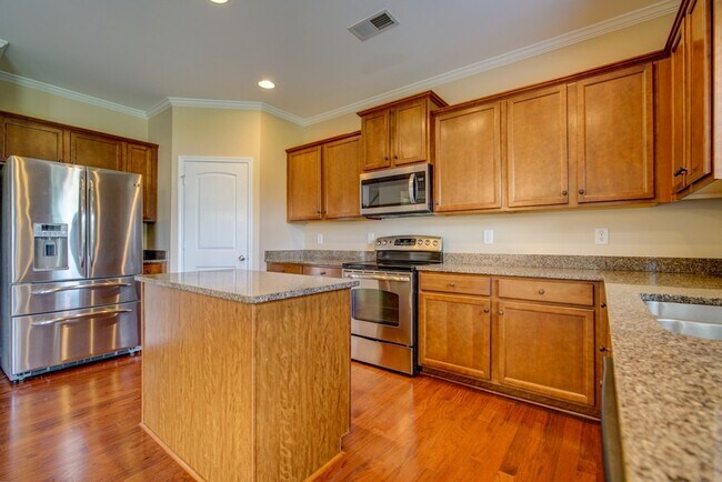 Building Photo - Gorgeous 4/5 BR, 3 BA, 2 Car Garage Home with Fenced Backyard and Large Storage Unit