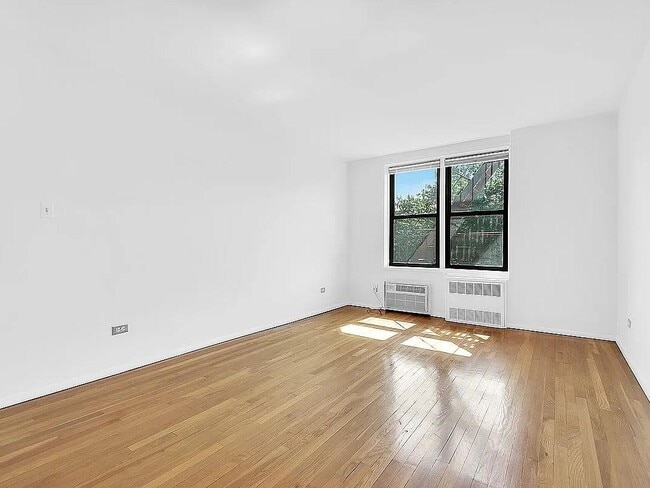 Building Photo - 35-20 Leverich St