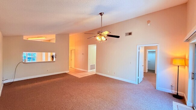 Building Photo - Bright 3/2 Home Near UCF with Vaulted Ceilings & Spacious Backyard!