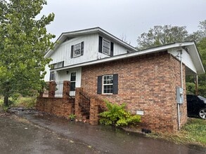 Building Photo - Available July 1st***Welcome to this charming 4-bedroom, 2-bathroom home located in the heart of ...