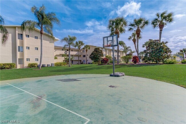 Building Photo - 55+ Charming first-floor condo nestled in the serene Fairways 3 Condominiums