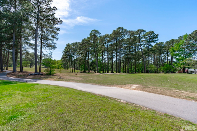 Building Photo - 8845 Wildwood Links