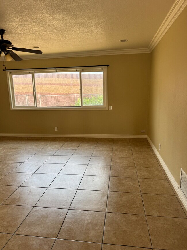 Building Photo - Large yard, spacious interior, extra parking and much more