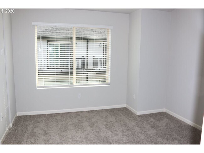 Building Photo - Modern 3-Bedroom Townhome-Style Home with Attached Garage, Private Patio & En-Suite Bathrooms in ...