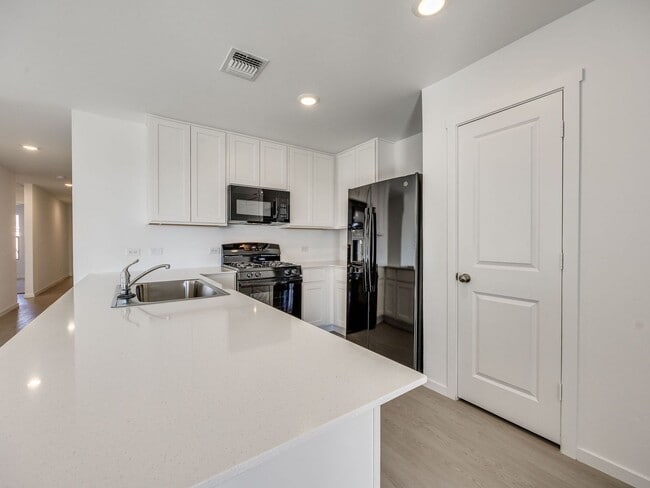 Building Photo - Brand New Home + Mustang Schools + 4 bedrooms + 2 car garage + All Appliances