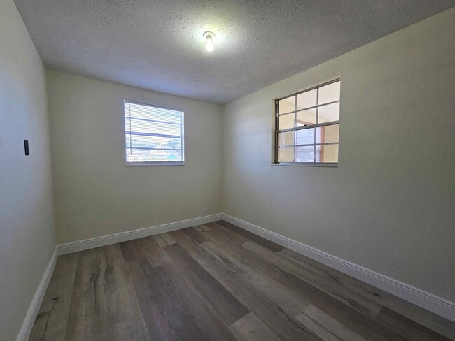 Building Photo - Two Bedroom Home with Large Fenced-in Yard