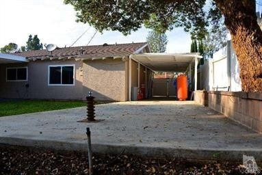 Building Photo - Located on a tree-lined street in Thousand...