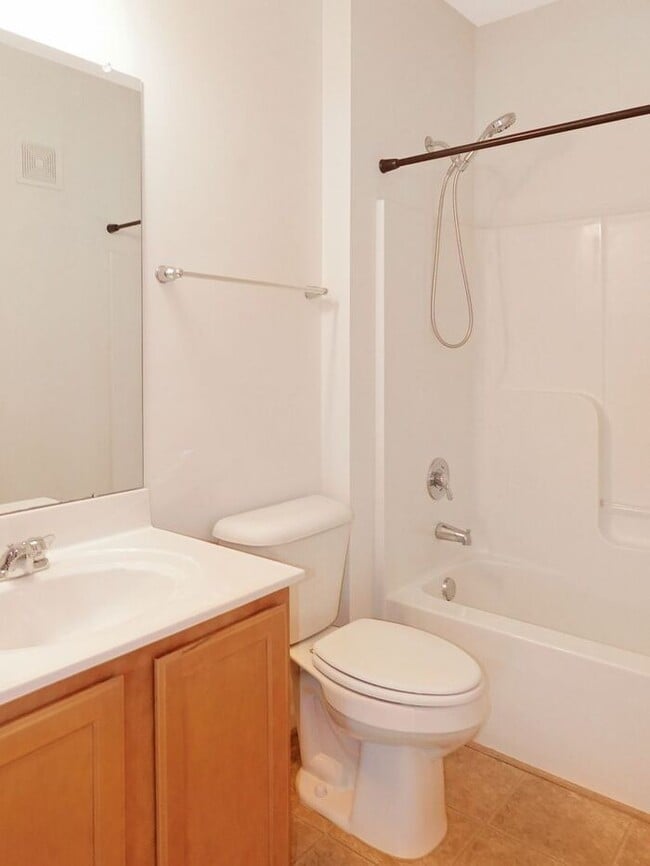 Building Photo - Pet Friendly Condo with Private Balcony and 1 Car Garage