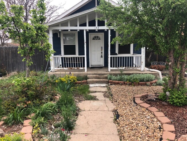 Primary Photo - "Charming 4-Bedroom Oasis with 2 Full Bath...