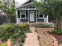 Building Photo - "Charming 4-Bedroom Oasis with 2 Full Bath...