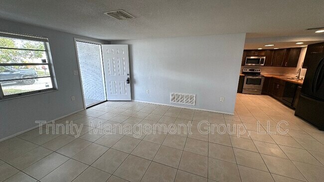 Building Photo - 8943 Windsong Ln