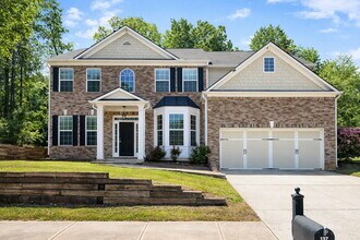 Building Photo - Clean 5 Bedroom Collins Hill Home with First Floor Suite and Oversized Master