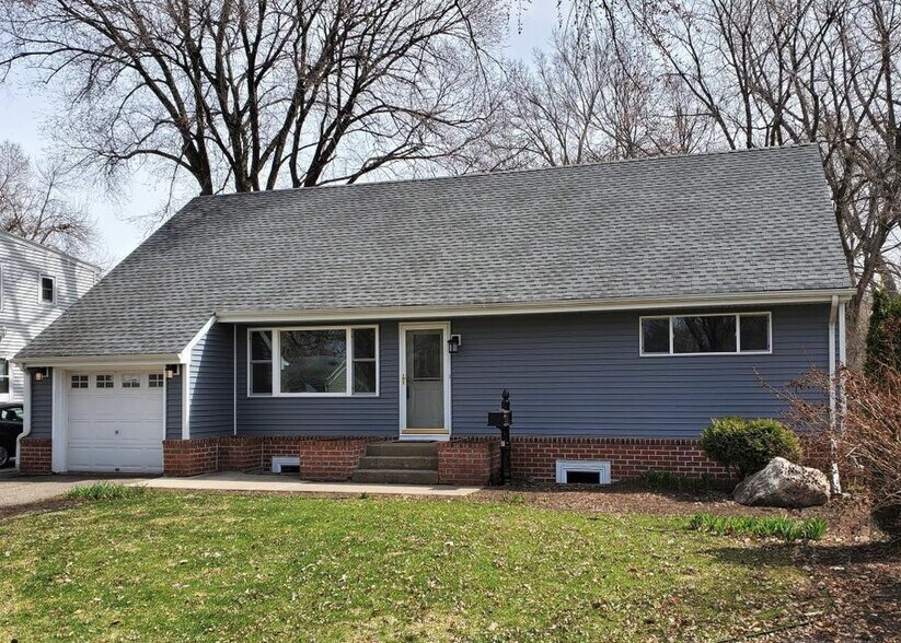 Front entrance to owners home (your private entrance is a path to right side of the house in back) - 1651 Dakota Ave S
