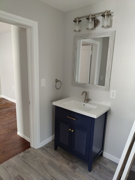 bathroom of second bedroom and living room - 350 Dora Drawdy Way