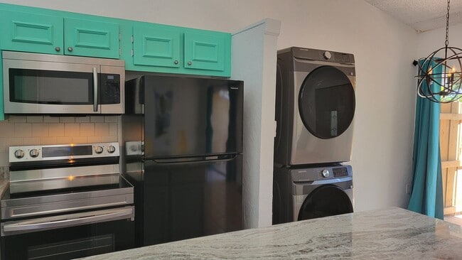 Building Photo - Annual UNfurnished renovated 2/1 condo dow...