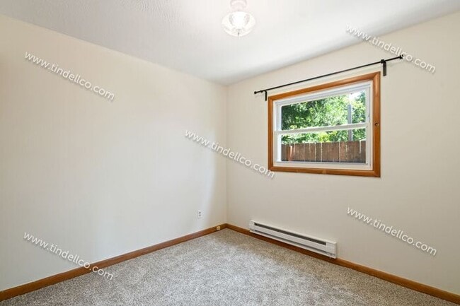 Building Photo - Charming 2-Bedroom Home in Desirable Woodstock Area – Pet Friendly!