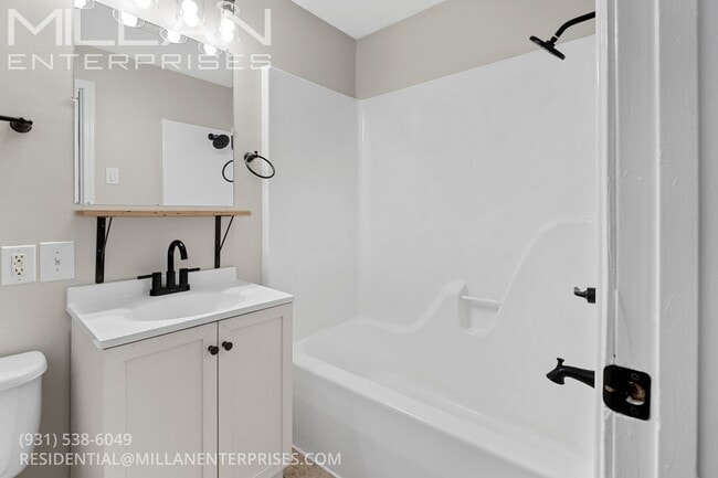 Building Photo - Charming Three Bedroom Home with Natural Privacy and Prime Location