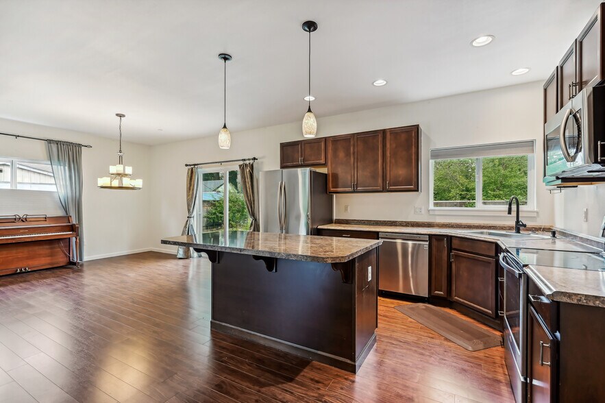 Kitchen and dining are - 9306 208th Ave E