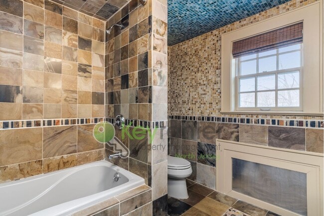 Building Photo - Charming 4-Bedroom Home on 2 Acres—Woods, Trails & Exceptional Storage