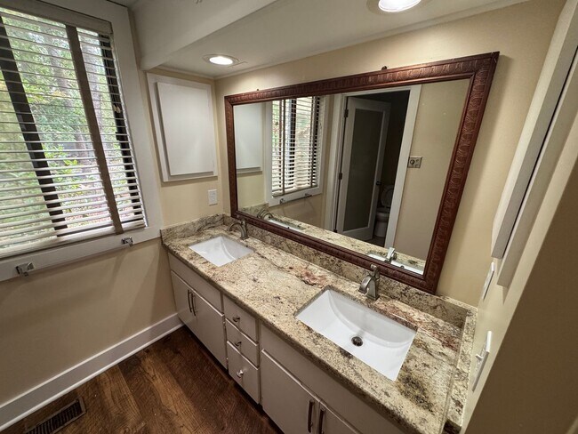 Building Photo - 3 Bedroom 3 Bath Beauty on Golf Course with Wet Bar and Storage Building