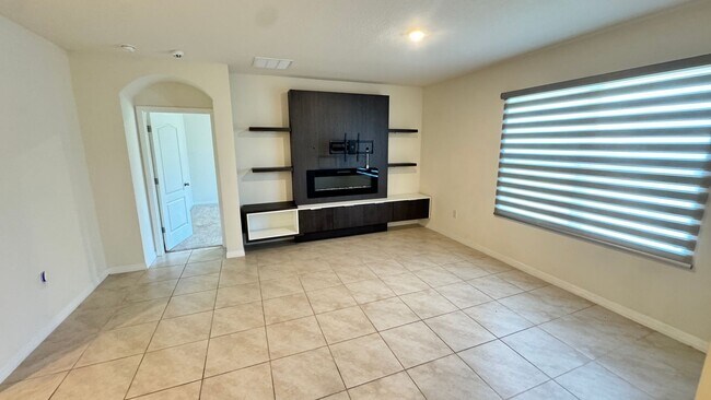 Building Photo - Available NOW! Spacious 4BD/2BA Haven in Villages at Harmony – Your Dream Home Awaits! WASHER & D...