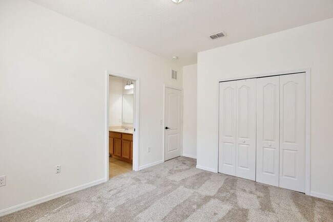 Building Photo - Water-View 4BR/3BA with 3-Car Garage in Gated North Shore - Near Lake Nona & Medical City
