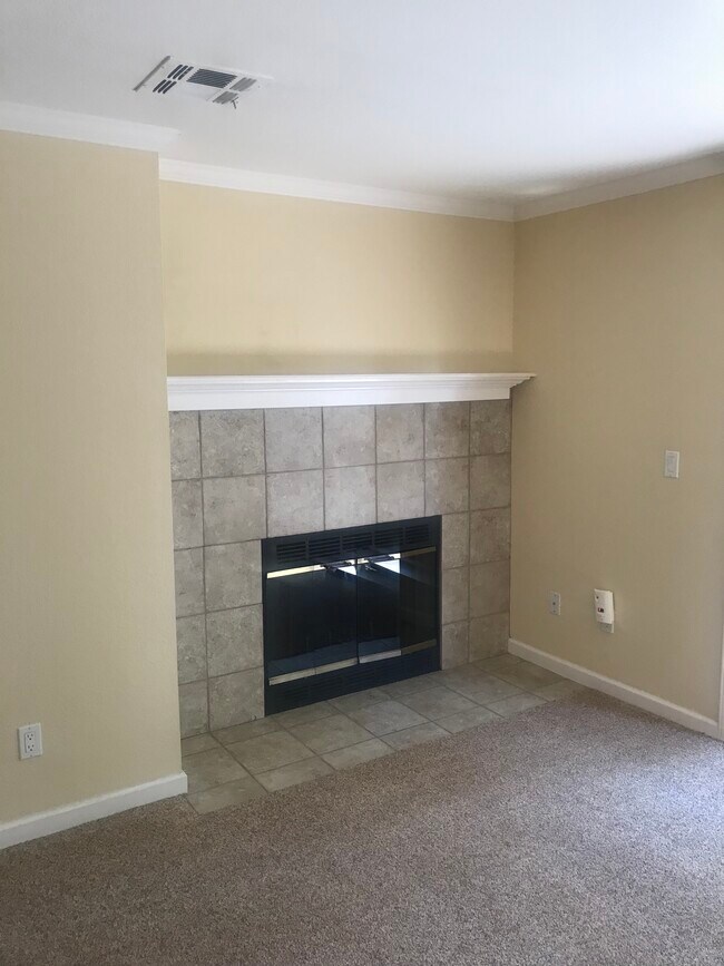 Fireplace with wood mantle - 351 Eastridge Dr