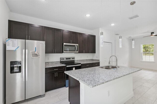 Building Photo - 10089 N Athenia Dr
