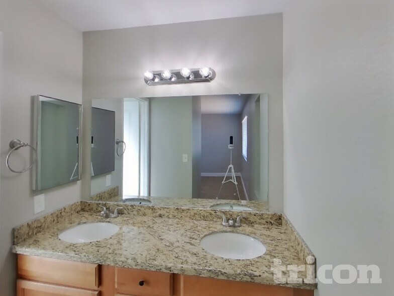 Building Photo - 9026 N 64th Dr