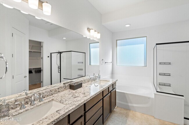 Building Photo - 10812 E Tesla Ave