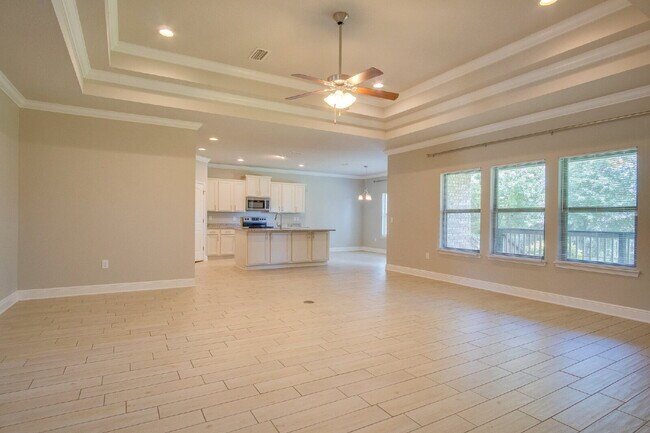 Building Photo - Spacious 4BR Pool Home with Modern Upgrade...