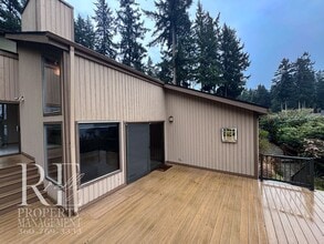 Building Photo - Vaulted 2-Bed Home with Scenic Views, Gas Fireplace & Oversized Deck