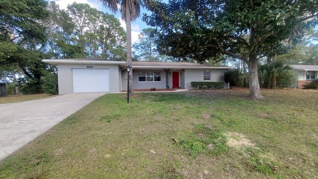 Building Photo - Large 3 Bedroom, 2.5 Bath with large Den and Family Room in Rainbows End, Dunnellon, FL