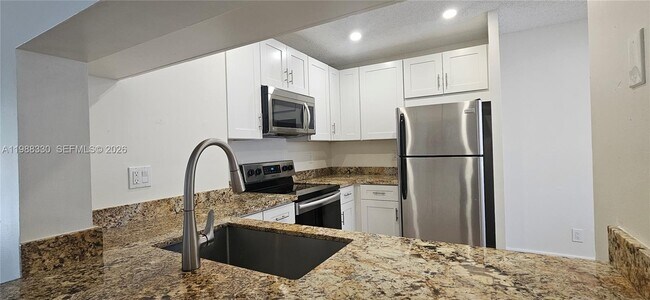 Building Photo - 11323 Royal Palm Blvd