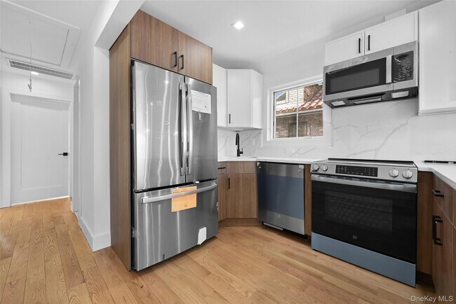 Building Photo - 38-40-40 215th St