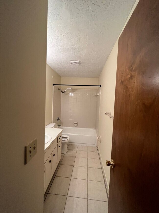 Building Photo - Two story duplex home! feels private like ...