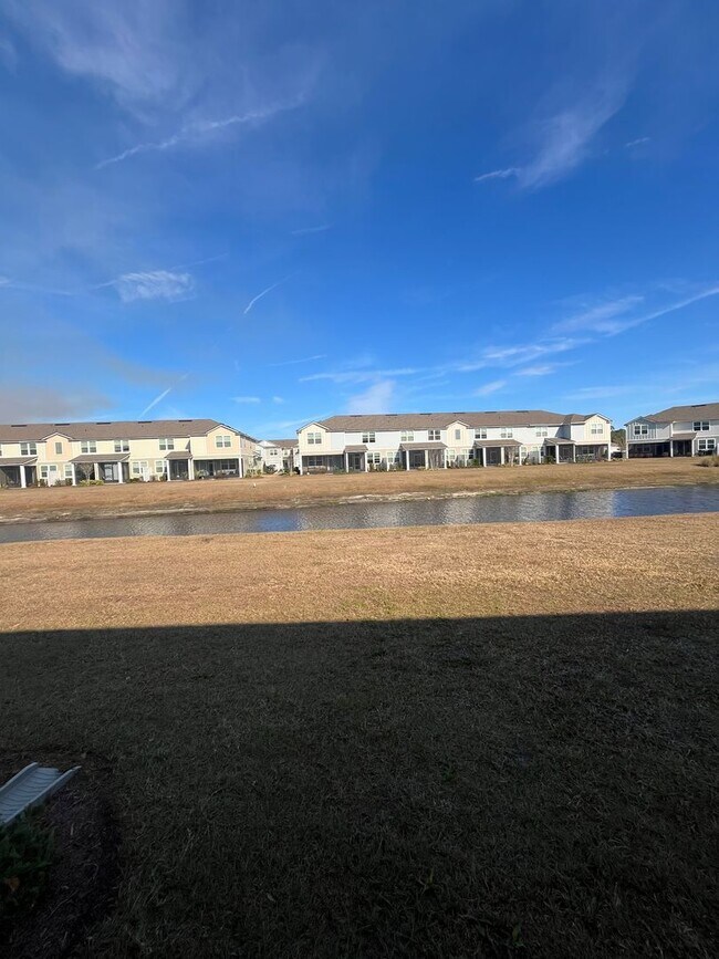 Building Photo - Town Home in The Trails -2 Primary Suites!!