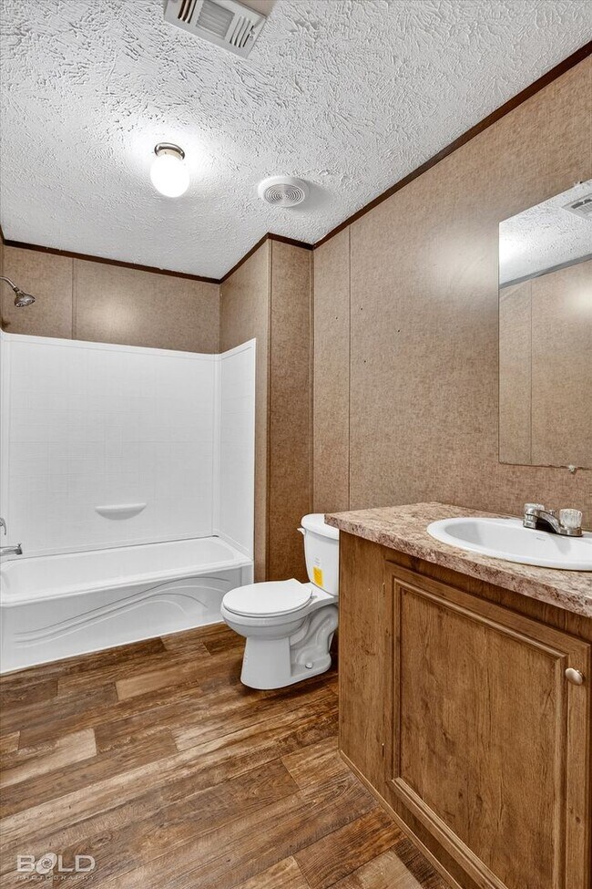 Building Photo - 4BD/2BA home with fenced back yard.