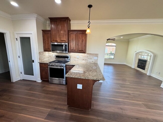 Building Photo - Upscale Modern 4 Bed | 2.5 Bath – Yard Maintenance Included | 2,271 Sq Ft | Prime Location