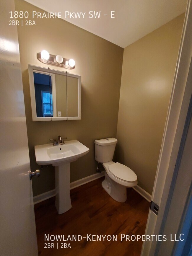 Building Photo - 1880 Prairie Pkwy SW - E- 2 beds, 1 full bath
